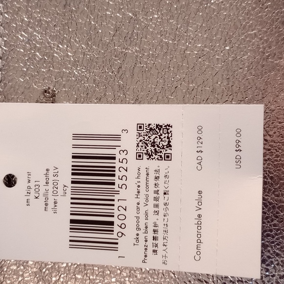 Kate Spade Lucy  small metallic wristlet nwt 31/2 x6 retails for 99$ - Picture 6 of 8